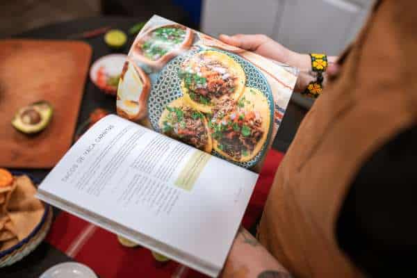 Incorporating Decorative Accents For Display Cookbooks On The Kitchen Counter