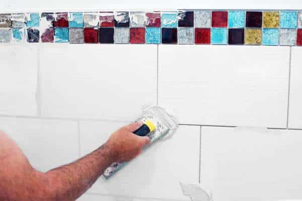 Enhancing The Overall Look With Fresh Grout And Caulk