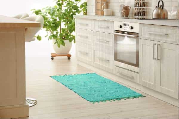 Using floor mats and rugs to reduce grease spread For Greasy Kitchen Floor Tiles